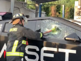 The first crack on the Tesla Cybertruck window formed after 3 light-to-moderate strikes with the emergency axe. (Image source: @OwenSparks_)