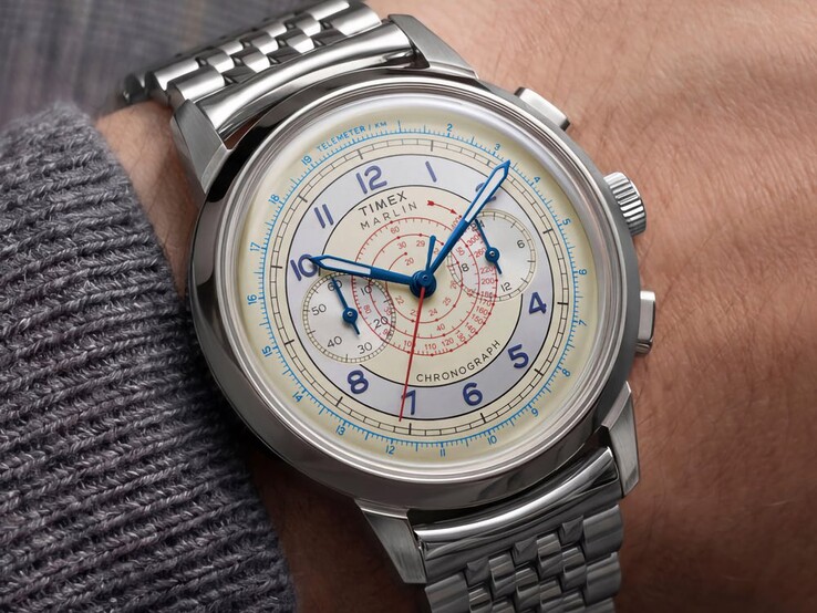 Timex Marlin Neo Classic Chronograph with a cream dial, blue hands, and stainless steel bracelet worn on a wrist.