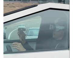 Tesla Cybertruck driver risks it all with Apple Vision Pro at the wheel (Image: @blakestonks / X)