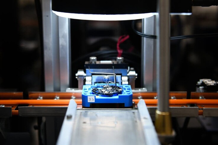 Casio G-Shock components on a conveyor belt on the automatic timepiece movement assembly line. (Image credit: Noriko Hayashi / New York Times)