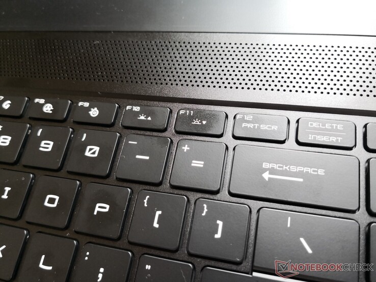 MSI GS66. Unlike almost every other laptop out there, the left key increases brightness while the right key decreases it