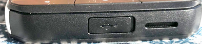 Bottom: USB-C connector, mono speaker