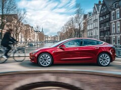 Model 3 riding with the Full Self-Driving feature.