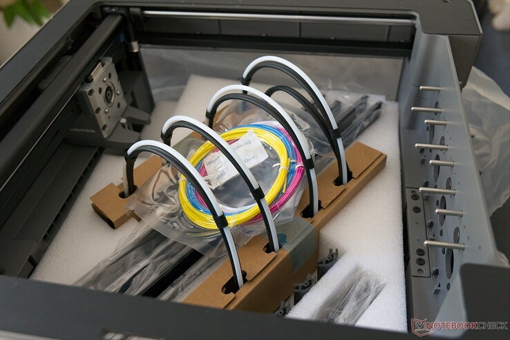 The printer generally comes in one piece, but still needs to be fully assembled.