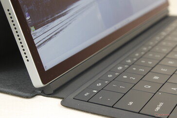 Keyboard base sits flat on the table to reduce teetering when typing