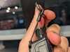 M1 comes with a lanyard and clip