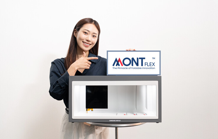 A woman presenting the new brand along with what looks like a new display panel (Image source: samsungdisplay.com)
