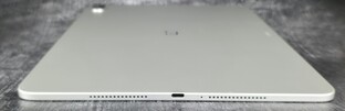 Right case side (speaker, USB port, microphone, speaker)