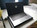 The Latitude 7400 2-in-1 stuck on the Dell splash screen when attempting to wake from sleep