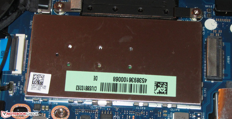 The RAM module is protected by a plate.