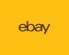The eBay Logo pictured in a yellow background