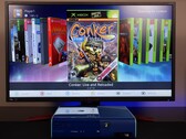 A modded blue Xbox 360 running a custom homebrew dashboard on a monitor, displaying the game “Conker: Live and Reloaded” alongside other Xbox and emulator titles. (Image source: Modern Vintage Gamer on YouTube)