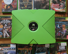 A green-colored Xbox with 10 retro Xbox titles pictured