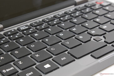 Surprisingly firm full-size QWERTY keys come at the cost of moderately loud "clicky" clatter