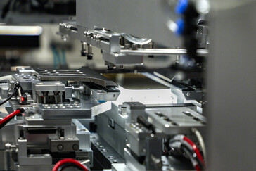 Individual phone display calibration at the factory