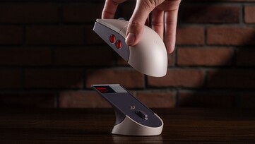 The 8BitDo Retro R8 Mouse - N Edition comes with a charging dock. (Image source: 8BitDo)