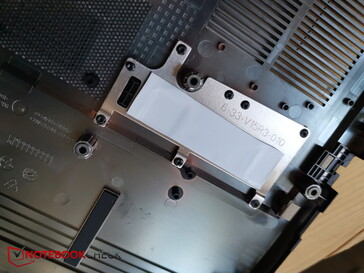 Cooling pad above the SSD on the bottom plate