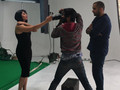 Model posing with an unseen smartphone. (Source: OnPhones)