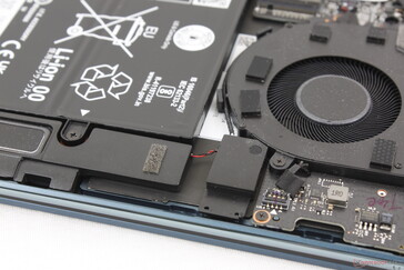 Two up-firing speakers emit through the keyboard keys