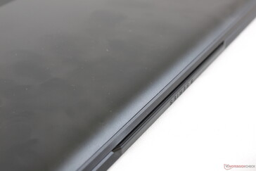 Top edge of the lid protrudes slightly for the webcam and to aid in opening