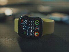 An Apple Watch SE on a table (Image source: Onur Binay via Unsplash; cropped)