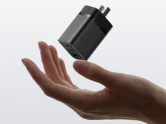 The Cuktech 6 mini has a three-port configuration. Pictured: a promo picture showing the black color option of the adapter. (Image source: Cuktech)