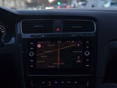 Car dashboard with a navigation map on the infotainment screen