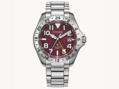 The Citizen Promaster Land GMT BJ7150-50W, pictured against a textured off-white background. (Image source: Citizen US)