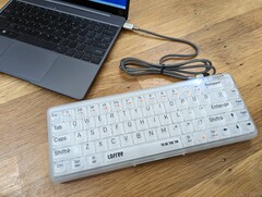 The Lofree 1% is a semi-transparent keyboard with MX &quot;Jellyfish&quot; switches wrapped in a polycarbonate deck