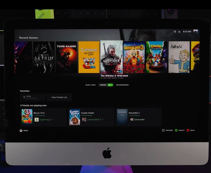 SteamOS running on a 2019 iMac displaying a game library interface with titles like The Witcher 3, Cuphead, Fallout 4, and Skyrim. (Image source: ETA Prime on YouTube)