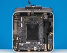 Internal view of the Beelink GTR9 Pro mini PC showing the vapor-chamber dual-fan cooling system and motherboard layout (Image source: ServeTheHome via YouTube)
