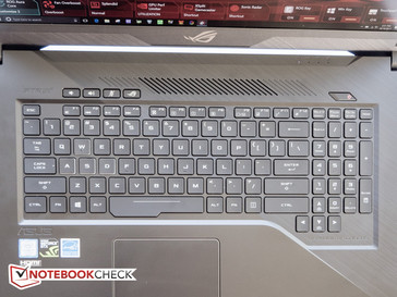 The keyboard features a larger spacebar and isolated arrow keys