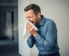The microbots can be simply ejected through means like sneezing (Image source: AI-generated illustrative image)