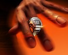 A person wearing the silver Casio CRW-H001M-8 smart Ring Watch on their finger, highlighting its compact digital display and metal construction.