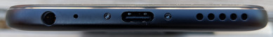 Bottom: headphone jack, microphone, USB-C port, speaker