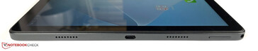Right: speaker, USB-C 2.0, speaker, hybrid SIM/microSD slot, 3.5-mm jack