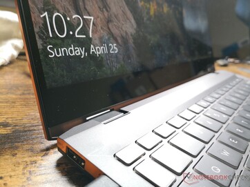 Edge-to-edge glass overlay with a thick bottom bezel