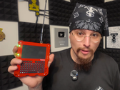 Kal holding the LoRa Radio Deck.