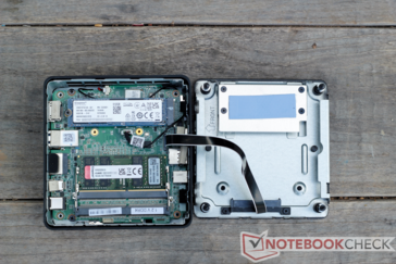 There is an empty 2.5 SATA bay on the underside of the bottom panel.