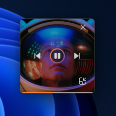 Microsoft showcases the new Media Player's mini player mode, which displays vibrant album art. (Image: Microsoft)