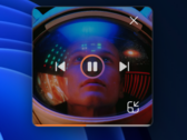 Microsoft showcases the new Media Player's mini player mode, which displays vibrant album art. (Image: Microsoft)