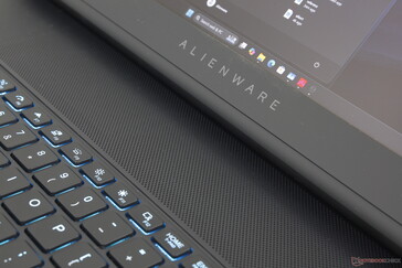 Hexagonal grilles replaced with smaller holes for both ventilation and audio