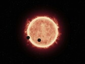 An artist's illustration showing a star and two planets.