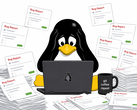 A Tux-style penguin overwhelmed by AI-generated bug reports flooding a Linux developer’s workspace.