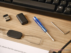 Magnetic screw driver and Allen key are included with the K4 HE. 