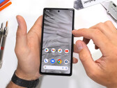 The Pixel 7a holds up well to being scratched, burned and bent. (Image source: JerryRigEverything)