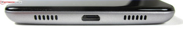 Lower edge: micro USB 2.0 port, speaker