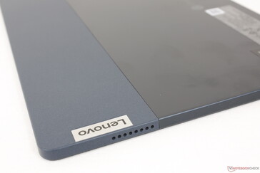 Aluminum metal back with soft-touch coating along the top third