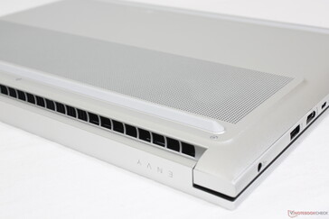 The bottom surface is raised around the ventilation grilles in order to support a thicker cooling solution