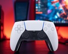 DualSense PS5 controller seen in front of PC monitor